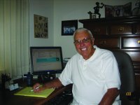 Verne Scott at his desk