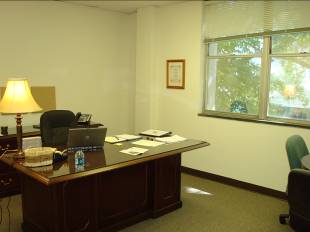 Rob&rsquo;s office furniture was donated and provides plenty of work space